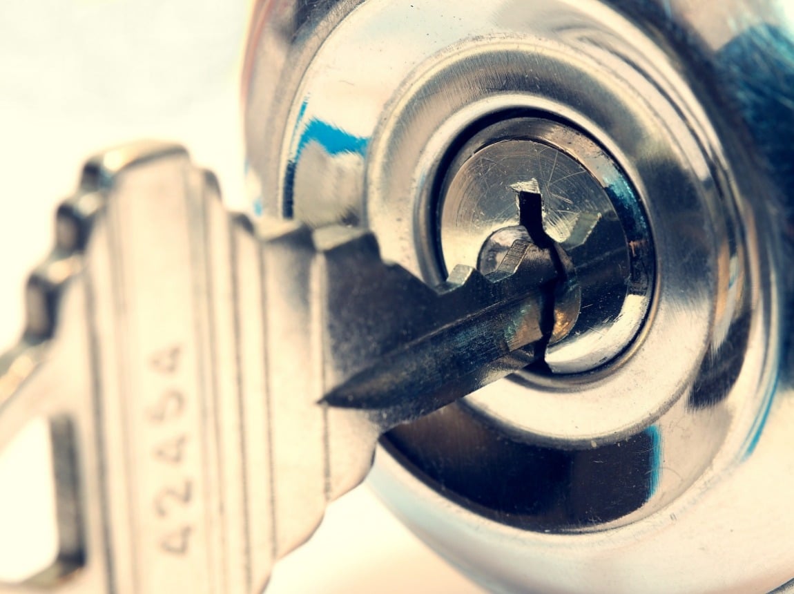 closeup of key inside lock